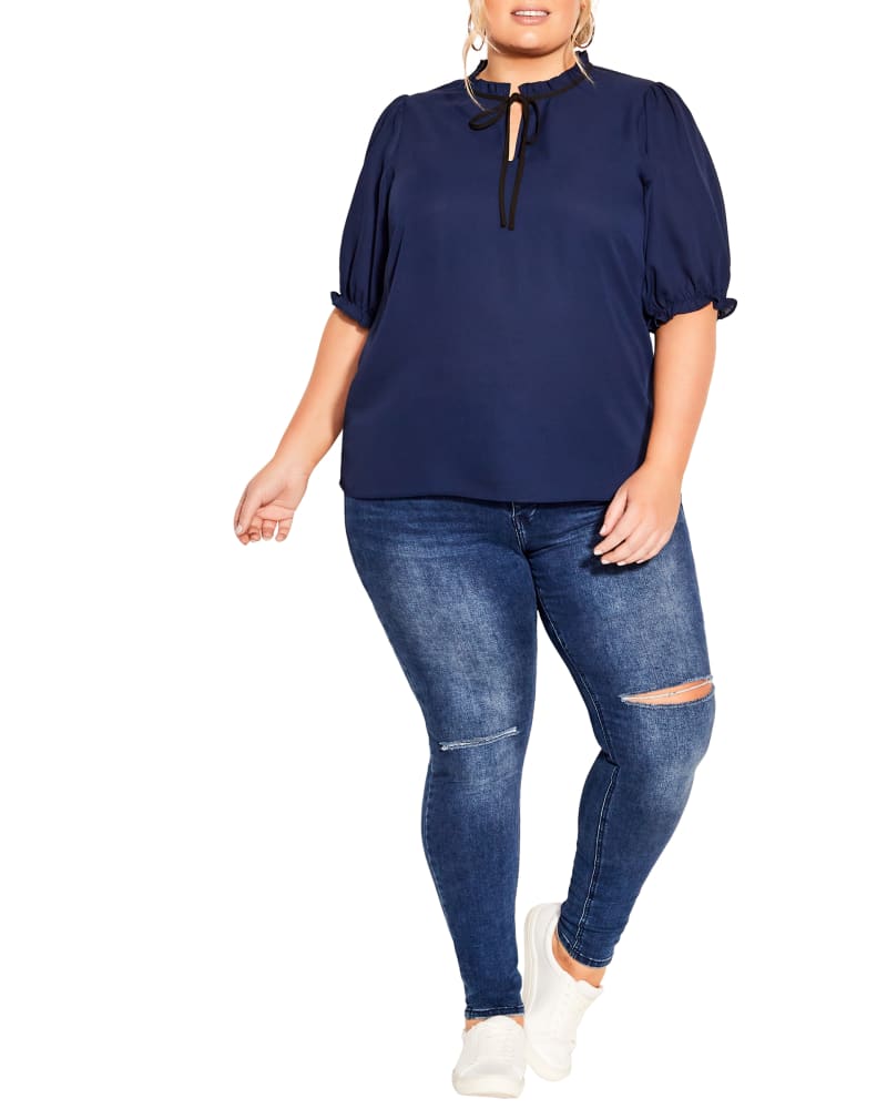 Front of a model wearing a size XL TOP DEMURE DETAIL in Navy by City Chic. | dia_product_style_image_id:302791